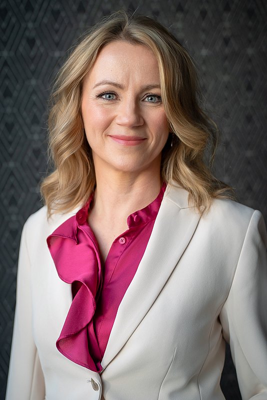 St. Louis Chief Financial Officer, photograph of a woman wearing a pink blouse. 