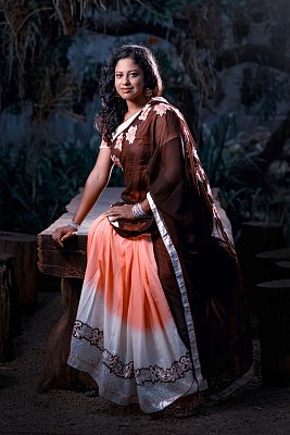 Woman in a brown sari in Myanmar. 